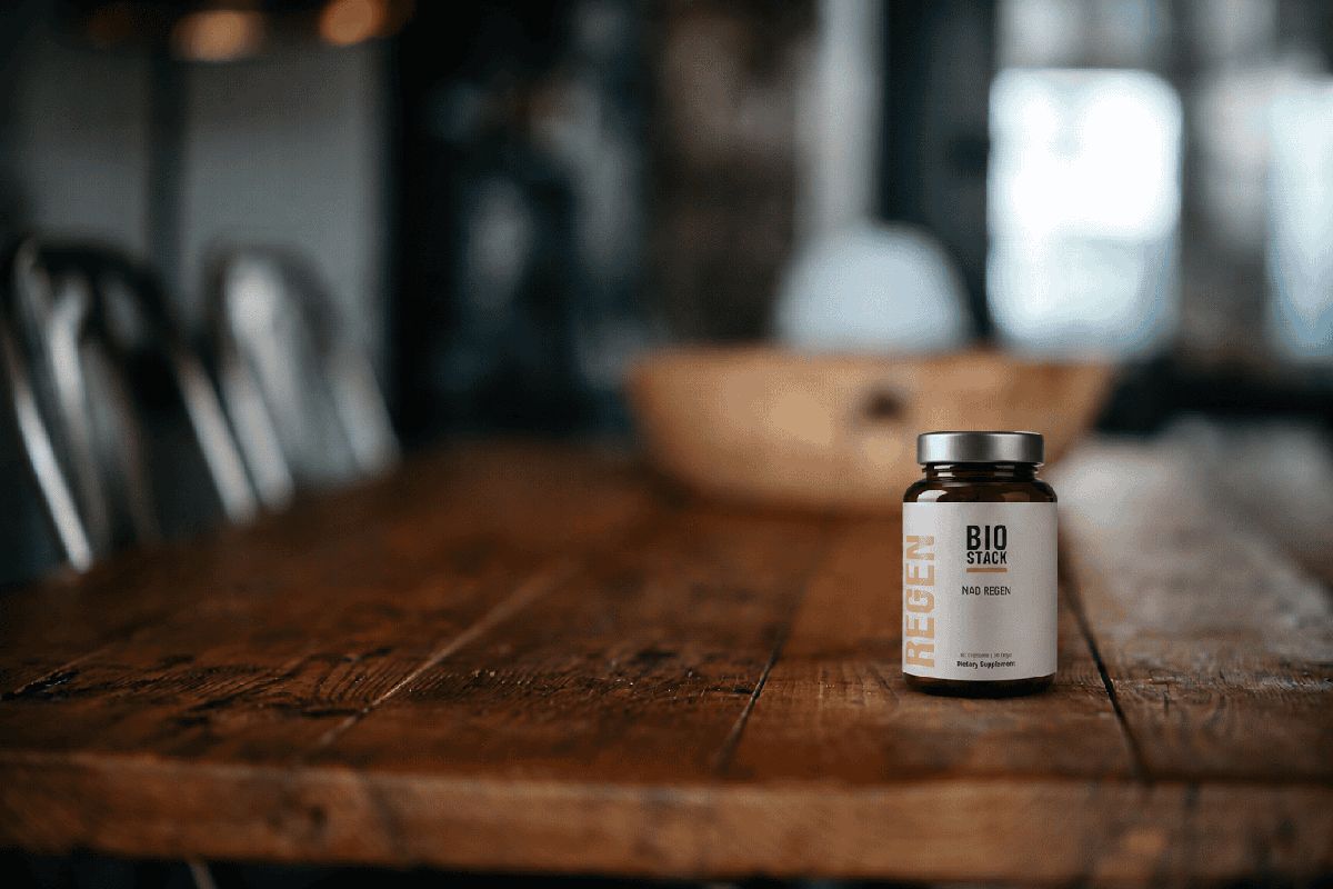 NAD Regen bottle on a wooden table